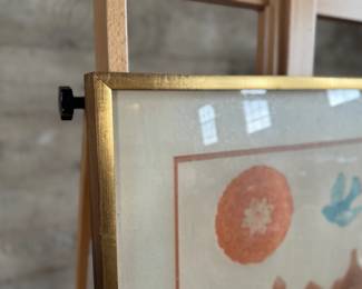 “City of Gold”, a limited edition print by listed artist, Marcia Isaacs and printed by Master Printer, Bill Wheeler. Edition 43/150, titled, and signed lower right by the artist. Certificate of authenticity and bio on the verso. Measures in frame, 26.5” H x 23.25” W. Isaacs has dabbled in etchings, monotypes, mixed media, collages, paintings, and digital imagery. Marcia Isaacs attended UC Berkeley, obtained her BA in Art from UCLA (University of California Los Angeles) and her Masters of Art from CSUN (California State University Northridge).