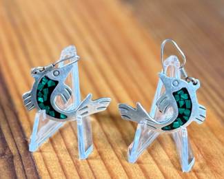 This lot features a pair of stunning vintage Taxco silver "fish" earrings with inlaid malachite.