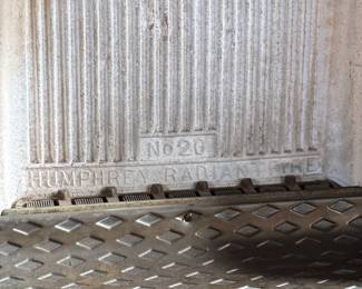 Humphrey Radiantfire No. 20 gas heater by the General Gas Light Co., Kalamazoo, MI. Crafted from cast iron, featuring intricate detailing and the signature model plate. Ornamental design with original patina and wear consistent with age. Includes decorative elements and vented grate. Ideal for collectors or display. Measures, 22” H x 19” W x 11” D.