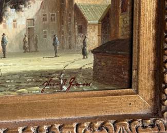 Framed oil on panel painting depicting a detailed village scene with several figures and buildings. Signed by the artist in the lower right corner. Encased in an ornate, gilt wooden frame with floral details. Measures in frame, 20.75” H x 24.75” W.