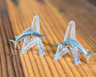 This lot features a pair of vintage sterling silver earrings depicting swordfish.