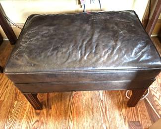 Grey leather ottoman