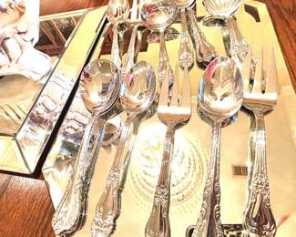 Assorted stainless serving pieces