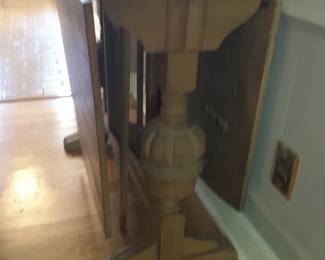 Side view showing legs of drop leaf table 