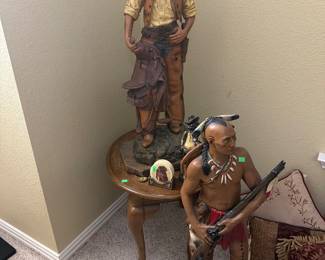 Wood statues of the Cowboy and Indian that were displayed at the Longhorn Steakhouse!