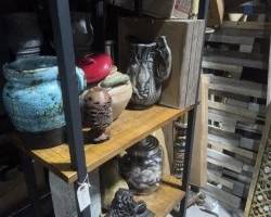 Wood and metal tall narrow shelf with decor pieces