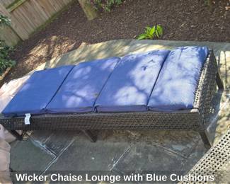 Wicker Chaise Lounge with Blue Cushions