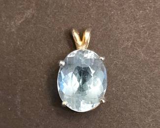 Oval Cut Aquamarine Pendant with Gold Bail