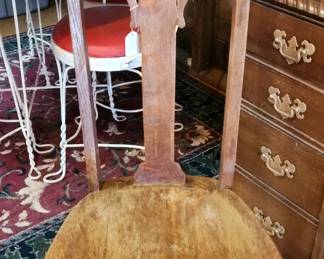 Very unusual oak chair with carvings