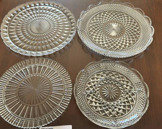 Lot 60: Four Clear Pressed Glass Serving Plates
