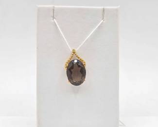 742  14k Gold Pendant with Topaz, 4.6g