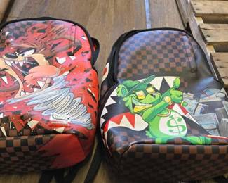 8104  2 SprayGround Backpacks