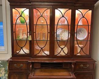 Georgian-style breakfront with curved glass and drop-down secretary