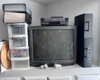 Tv, accordion folders, organizing bins