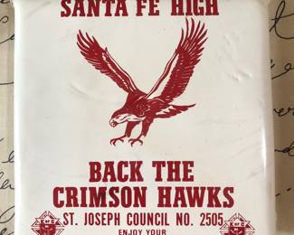 Memoribilia from Santa Fe High School.  1980’s stadium cushion.  Next photo shows advertisers.  