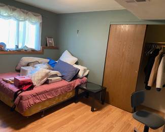 Twin bed, lots of bedding available