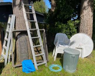 Two ladders, outdoor table and chairs, garden planter box