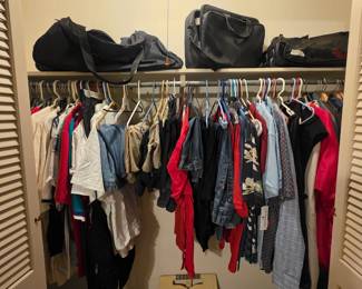 Bedroom closet - suitcases, bags and more women's clothing