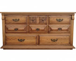 Oak Dresser with Ornate Drawer Pulls and Carved Panels