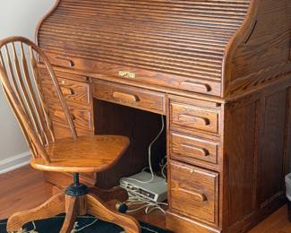 Roll top desk and chair. Very heavy and well made. 