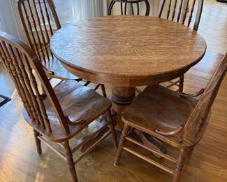 	#24	Oak Table with 4 chairs and glass top 35x29	 $125.00 				
