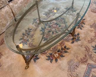 	#7	Glass & brass coffee table 51x25	 $125.00 				