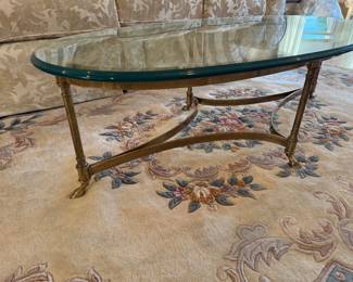 	#7	Glass & brass coffee table 51x25	 $125.00 				