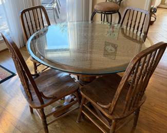 	#24	Oak Table with 4 chairs and glass top 35x29	 $125.00 				