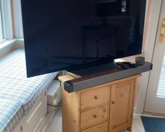 Flat Screen Smart TV with Soundbar