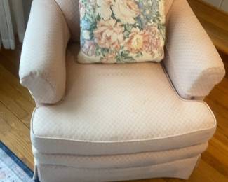 Classic Upholstered Armchair with Floral Accent Pillow