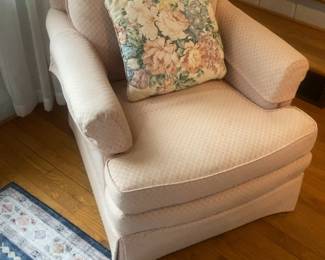Classic Upholstered Armchair with Floral Accent Pillow