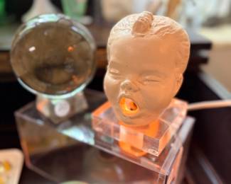 Oh dear… This is a strange little baby head lamp that we love!