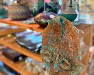 Neat small metal mask. Love the verdigris.