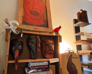 That is an interesting primitive piece at the top from an Alabama artist…