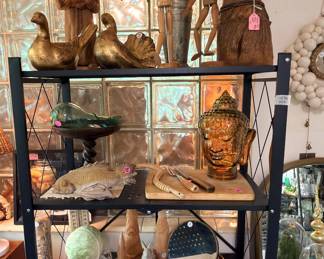 Off to the side in a little kitchen nook is the green and browns of the collections… I do love that strange porcelain cabbage head! I have to think to myself… Why was that made!?