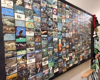 The artist produced a project using encyclopedia photos, and I think every letter in the alphabet is represented on these very large pieces he has throughout the house….