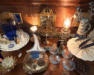 Beautiful cake plates and champagne/martini glasses. Menorah’s!… We have the tiny candles to go in the small one…