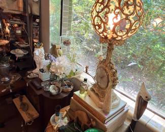 Yeah, this lamp looks kind of old-fashioned but it really is beautiful when it is lit up. And it keeps good time too…