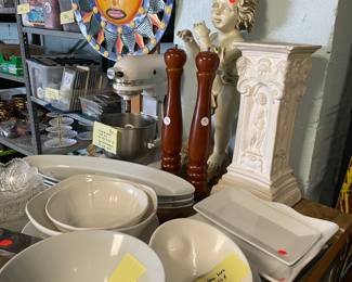 Assorted servingware, tall salt & pepper grinders, fun Mexican sign