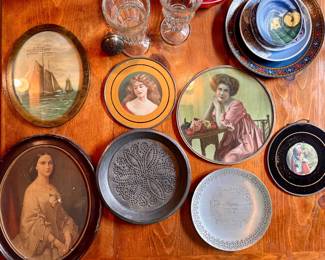 Antique women’s portraits and decorative plates