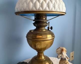 Brass kerosene lamp with milk glass shade