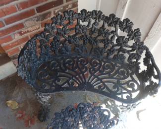 cast iron bench and small table