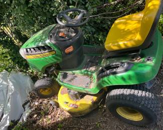 John Deere riding lawnmower (starts right up, works great)