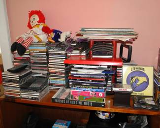CDs, Raggedy Ann. DVDs