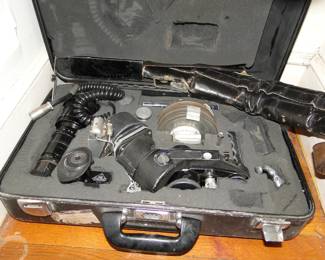 a closet full of camera equipment