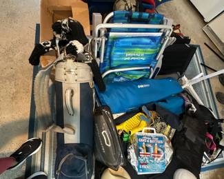 Golf clubs, sleds, folding chairs