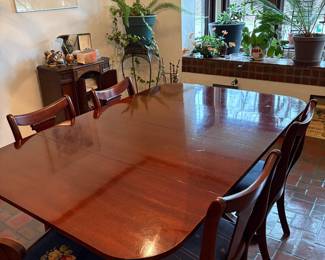 3 pedestal leg mahogany dining room table with leaves and pads