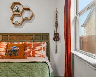 Queen bedding, hexagon shelf, ukulele