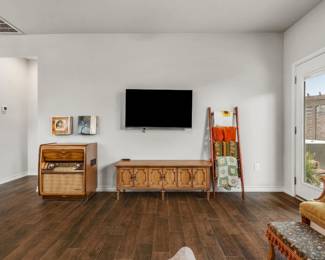 vintage console with working record player, MCM credenza, throw blankets