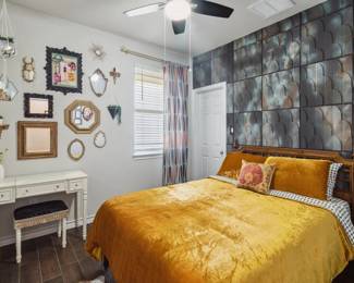 gallery style mirror collection, vanity and stool, queen bed, memory foam mattress and vintage MCM wood headboard